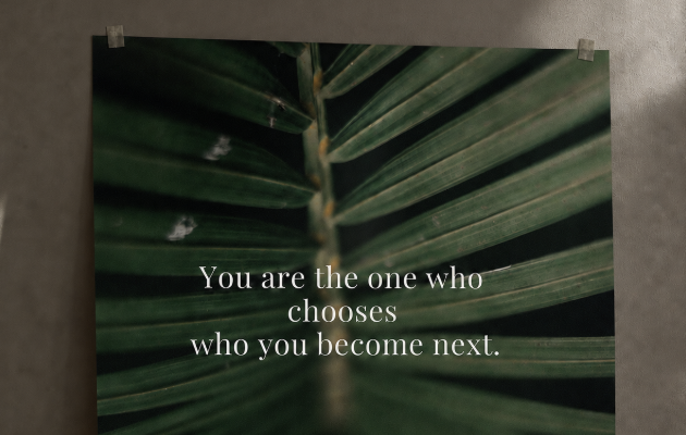 A printed poster with a quiet reminder taped to a wall